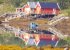 H�user spiegeln sich im Wasser bei Br�nnosund.